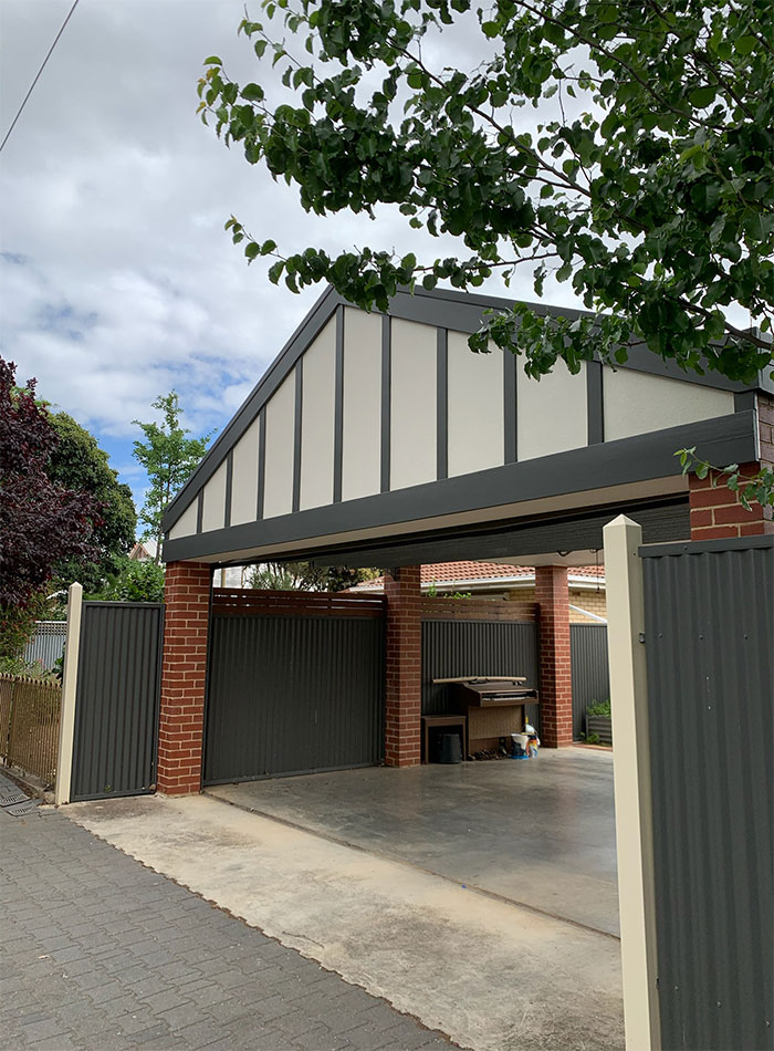 Refined Painting preparing a home exterior for repainting in Adelaide
